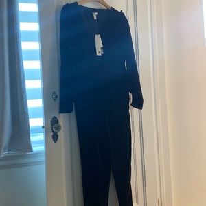 Monique L’huillier velvet jumpsuit.  Elastic waist. Never worn.